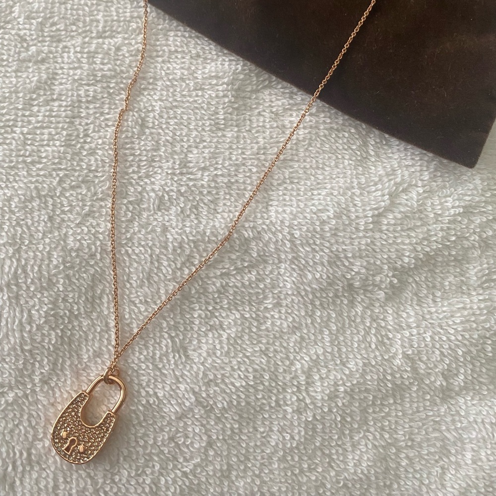 Rose gold Michael kors necklace